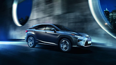 Zijkant van een grijze Lexus NX 300h